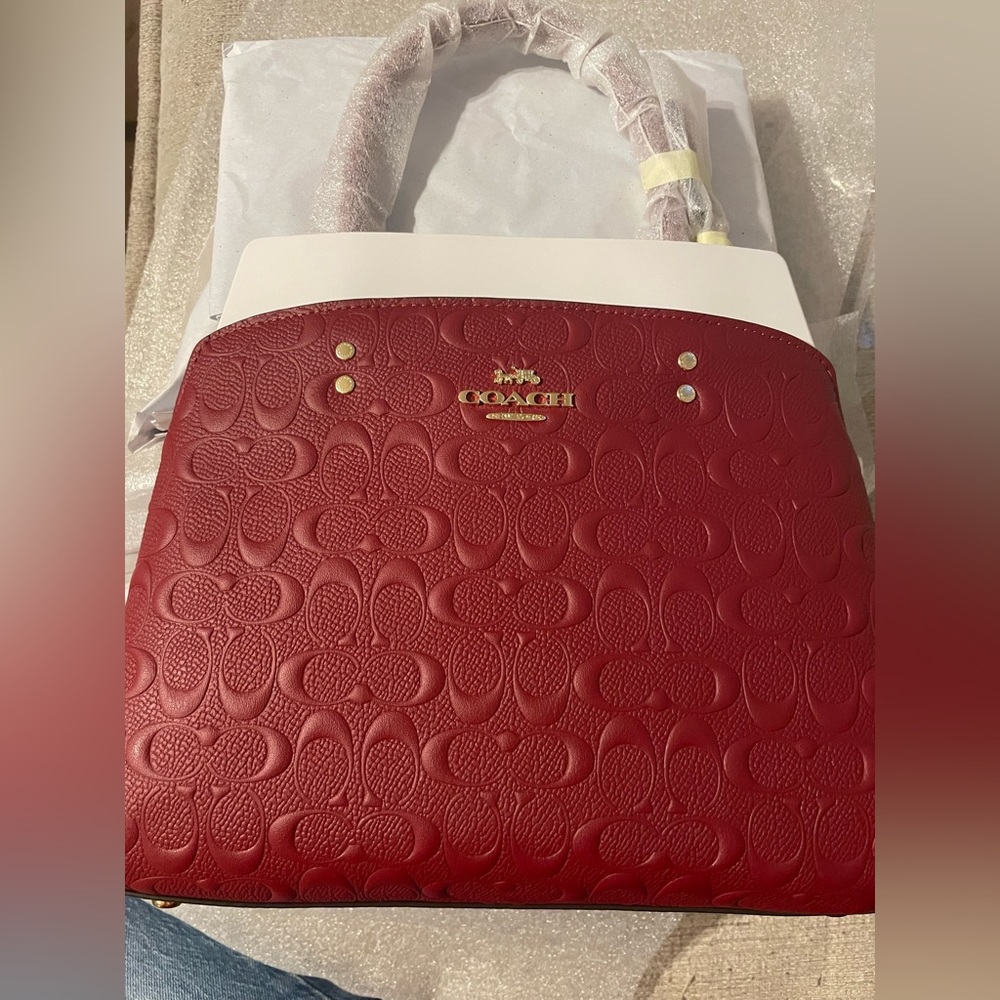 Red/cherry signature Coach tote